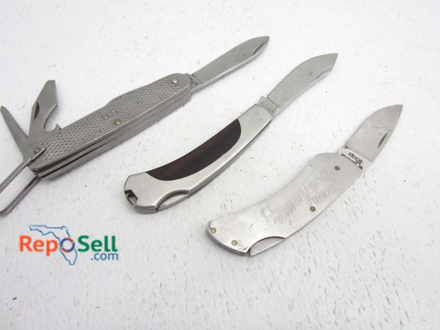 Lot 31-9440 - (3) Folding Knives: Zipp, Camillus, Ruko