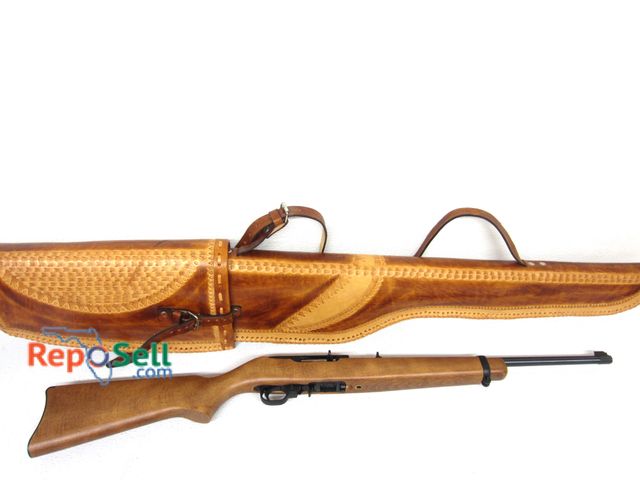 Lot 31-1466 - Ruger 10/22 .22LR with leather carrying case. 18.5" Barrel, one 10rd magazine.