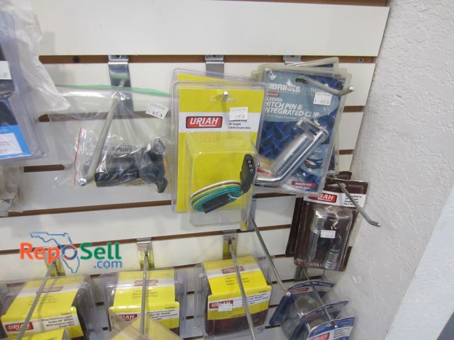 Lot 31-1231 - Assortment of new truck liners, 2-inch balls, trailer lights, etc.