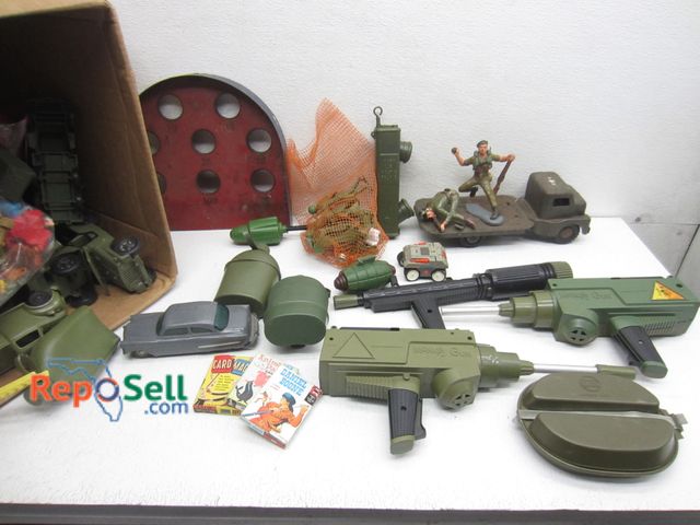 Lot 31-9355 - Lot Of US Army Trucks, Figures, Toy Guns etc