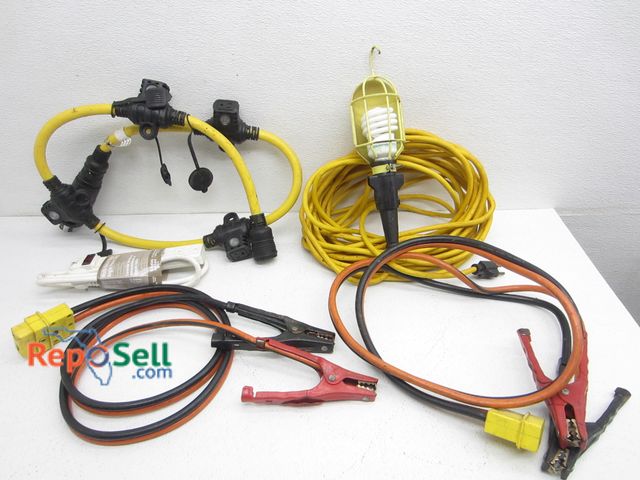 Lot 31-2465 - Multi-Outlet Generator Cord, Work Light (Power On) And Jumper Cables