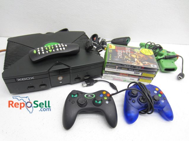 Lot 31-1172 - XBox (powers on), (2) Controllers, DVD Kit, (6) Games