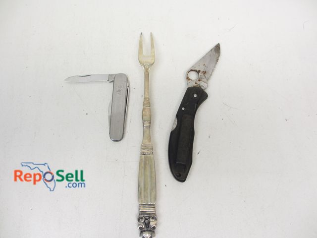 Lot 31-9272 - Estate Lot: Sterling Denmark Fork (.063oz), Paula Inox knife and spyderco knife