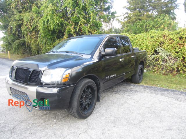 Lot 31-9700 - 2006 Nissan Titan Crew Cab Pickup Truck Black 2006 Nissan Titan Vin#1N6BA07A46N556292. Drives Forwar...