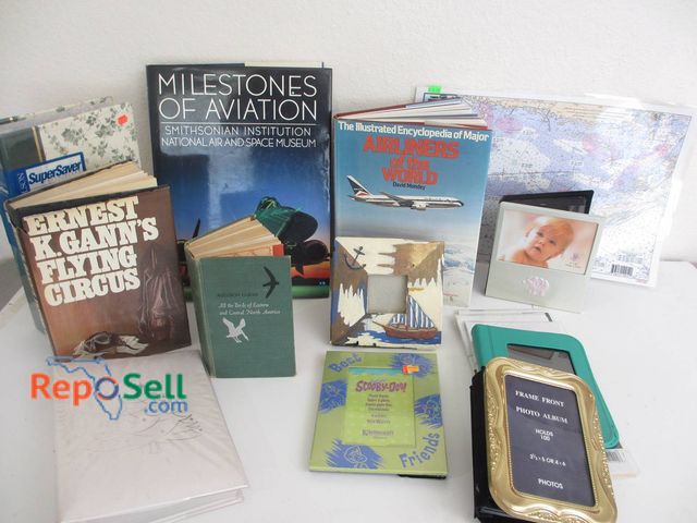 Lot 31-8540 - Lot of Aviation Books, Photo Albums, Frames, And Maps