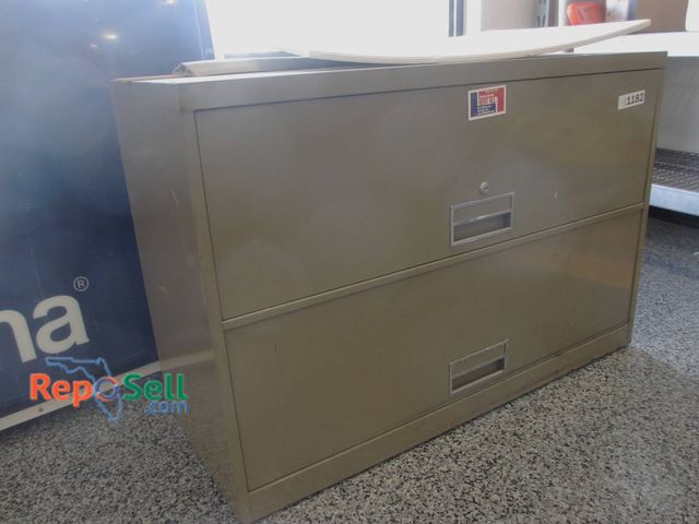 Lot 31-1182 - Lateral Filing Cabinet With Dimensions 42" X 18" X 28". The Cabinet Features Two Drawers And Include...