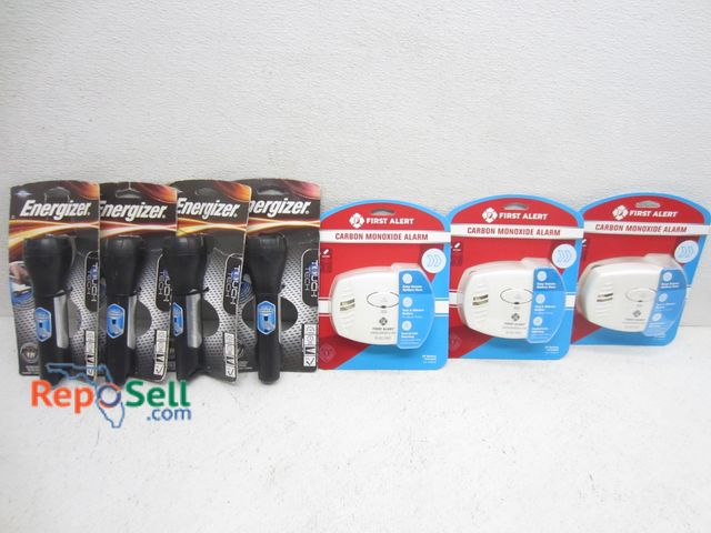 Lot 31-6201 - (3) new First Alert carbon monoxide detectors w/ 9v batteries included &amp; (4) Energizer flashligh...