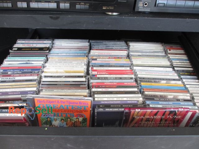 Lot 31-1011 - Large Lot of CDs (2 Cases Are Also Full) : Michael Buble, Patsy Cline, Cramer, Christmas Music, etc.