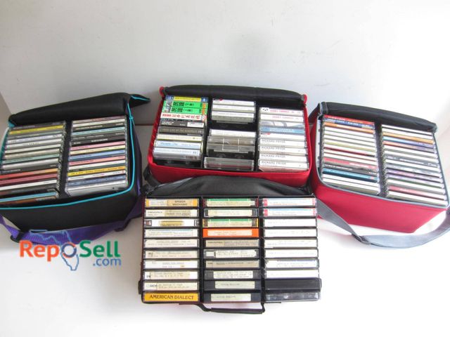 Lot 31-9230 - Three Case Logic soft storage bags containing a collection of cassette tapes, encompassing various g...