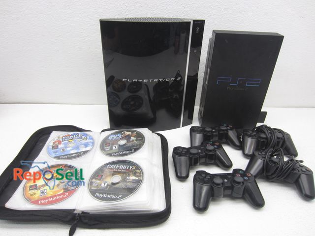 Lot 31-8107 - (2) PlayStations (2 &amp; 3), (5) Controllers, Case of CDs/PS Games/Xbox Games, etc. - Both Consoles...