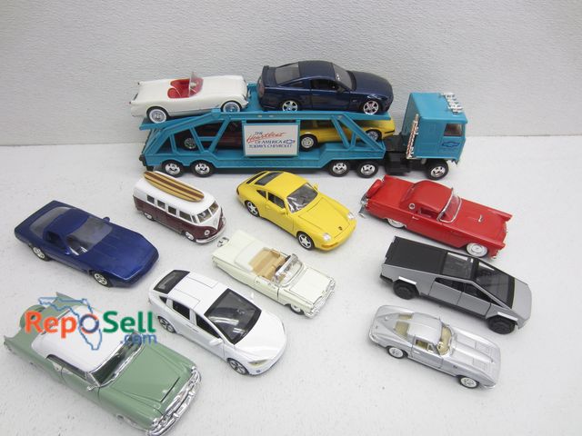 Lot 31-1067 - (13) Die-Cast Cars Mostly Metal And Chevy Semi Car Carrier