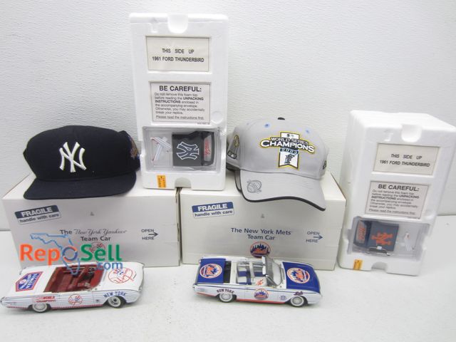 Lot 31-5226 - New York Yankees &amp; Mets Diecast 1:24 Team Cars &amp; (3) World Series Hats