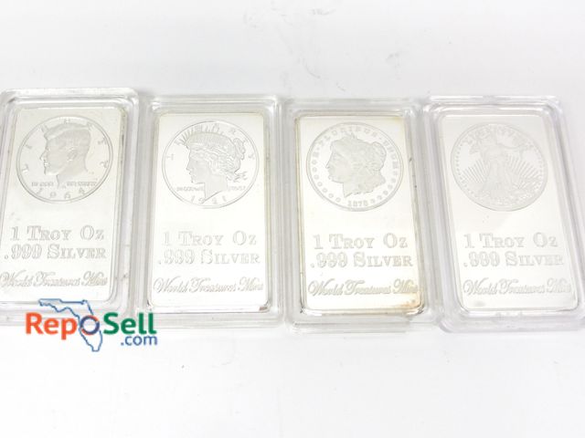 Lot 31-4020 - (4) 2012 1 oz. Silver Bars in Cases
