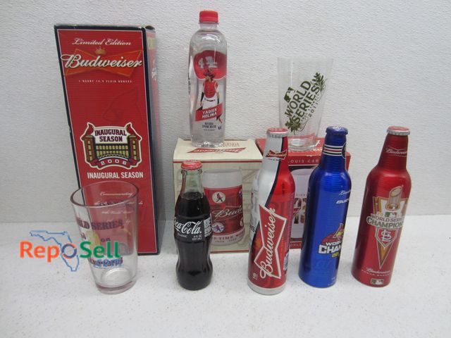 Lot 31-9194 - Lot Budweiser Collectibles with Tote: (2) Steins, 2006 Bottle, (2) Cardinal Glasses, etc.