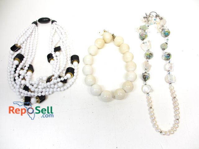 Lot 31-1546 - (3) Bead Necklaces: (1) Black/White Fiocchi Italy, (1) Shianna .999 and Large Bead