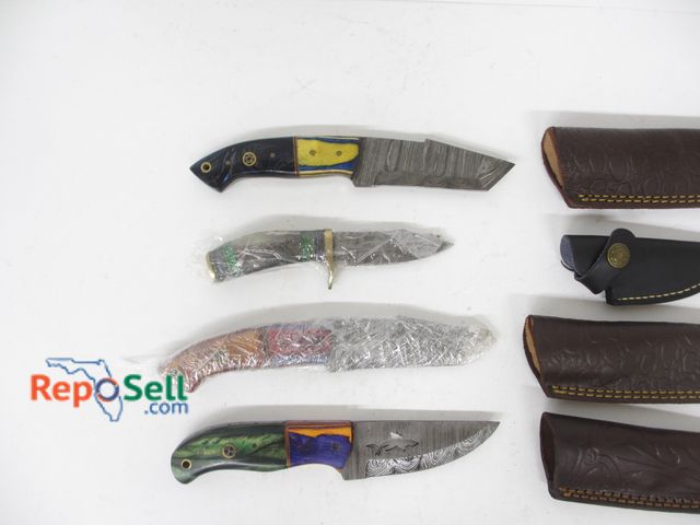 Lot 31-7078 - (4) Damascus-style knives with sheaths