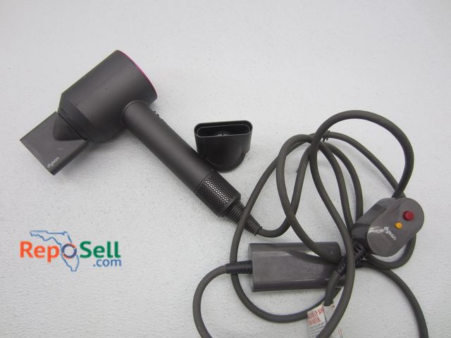 Lot 31-1139 - Dyson Hair Dryer w/ (2) Adapters - Powers On