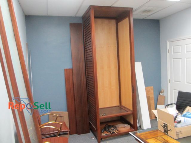 Lot 31-8177 - Very Large (to ceiling) Wood Storage Cabinet with Glass Door (not attached) 9ft H x 30"D x 35.25"W -...