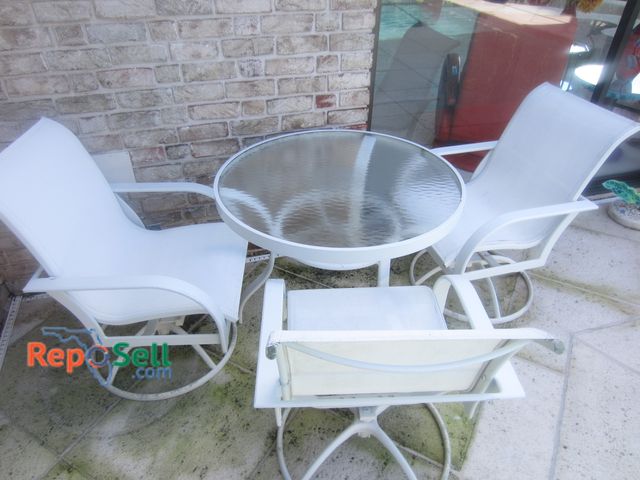 Lot 31-1401 - Glass Top Patio Table &amp; (3) Chairs