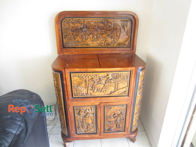 Lot 31-8652 - Vintage Hand-Carved Oriental Wood Liquor Cabinet With Scenic Panels