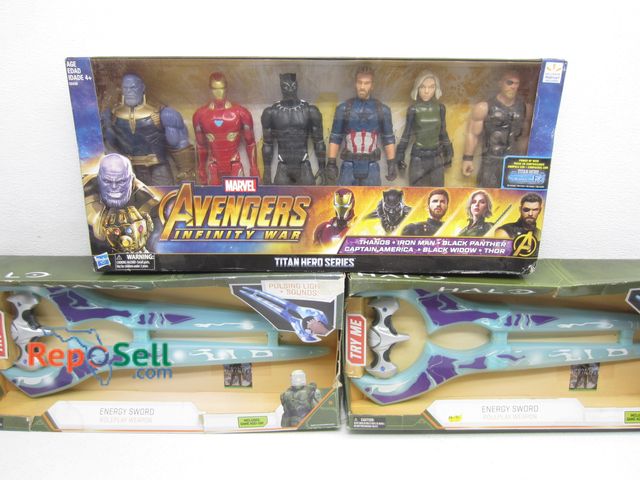 Lot 31-8203 - (2) Halo Energy Swords &amp; (1) Avengers Superhero Figurine Set - All Appear New