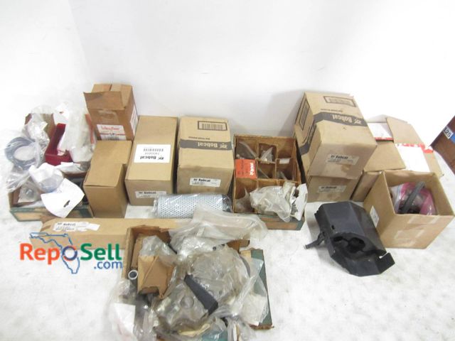 Lot 31-1261 - Equipment Parts Including Bobcat Components Such As Gas Spring, Rollers, Filters; And Luber-Finer Fi...
