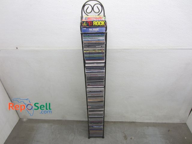 Lot 31-8527 - Approx (98) CD's With Stand: Barry Manillow, Neil Diamond, Alan Jackson etc