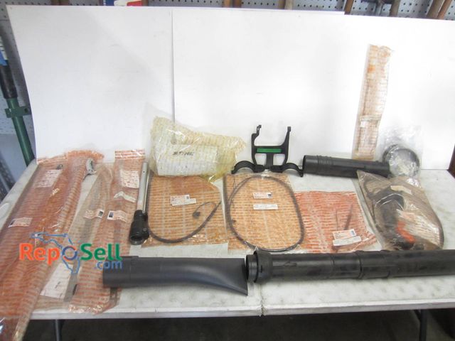 Lot 31-1241 - Stihl Lawn Equipment Parts And Accessories, Including Drive Shafts, Cover Plates, Cables, Handles, A...
