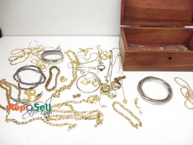 Lot 31-2016 - Costume Jewelry and Wood Storage Box with Key: Necklaces, Bracelets, Earrings, etc.