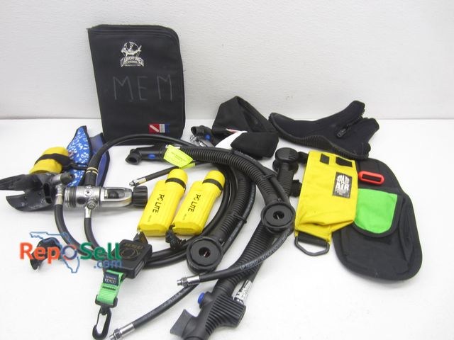 Lot 31-1311 - Scuba Diving Accessories: Flashlights, Dive Logs, BCD Inflators, Dive Straps, etc.