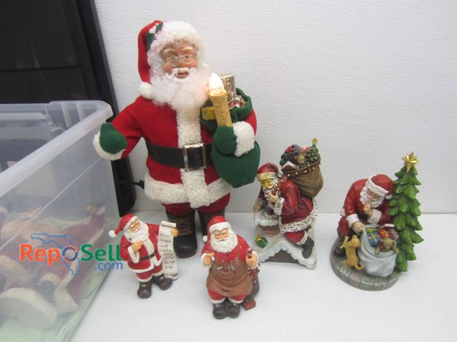 Lot 31-9080 - (9) Red Santa Collection: (8) Ceramic And (1) Electric (Power On) With Tote