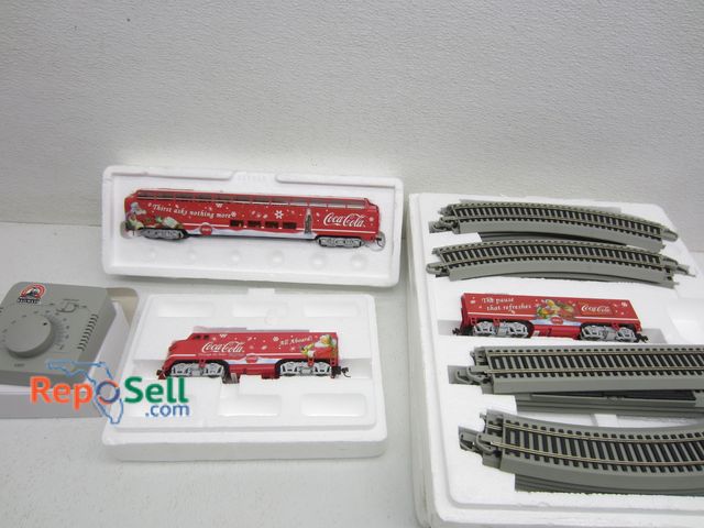 Lot 31-3405 - Coca Cola Christmas Trains/Tracks
