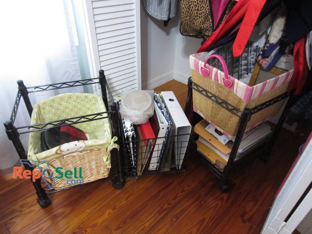 Lot 31-9025 - Three Rolling Carts Made Of Black Metal With Wicker And Fabric Basket Inserts With Misc Office Suppl...