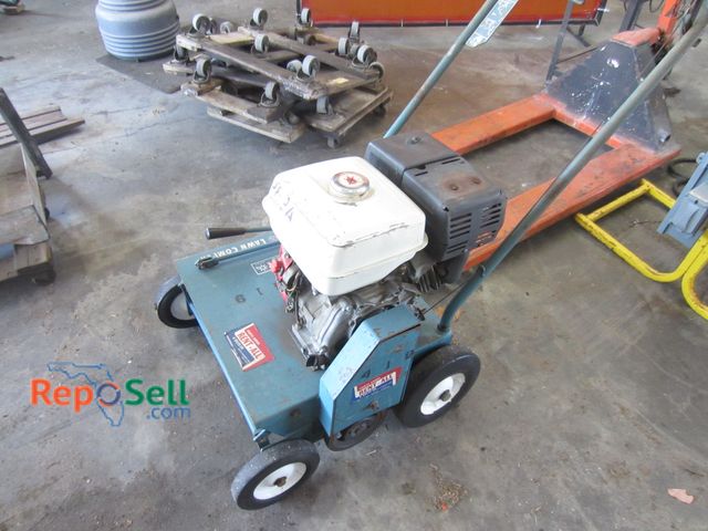 Lot 31-1038 - Bluebird Lawn Comber Honda 9.0 - Powers On
