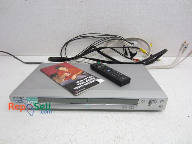 Lot 31-6209 - Sony DVD Player w/ Cables, Remote and Owners Manual