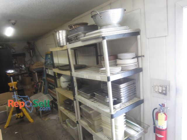 Lot 31-2064 - (2) Plastic Racks w/Contents: Pizza Trays, Pots, Dishes, etc. - Rack Optional - BRING TOTES
