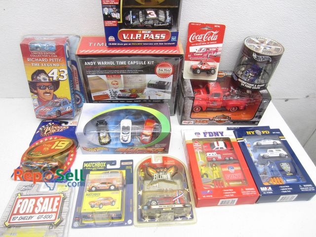 Lot 31-9398 - Lot of Toys in Packaging: Andy Warhol, Richard Petty, Harley, etc.