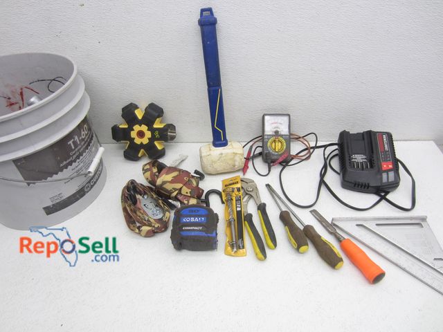 Lot 31-4540 - Bucket of Tools: Craftsman Charger, Rubber Mallet, Tape Measurers, etc.
