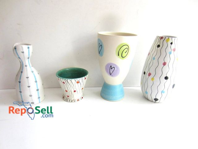 Lot 31-9153 - Four ceramic vases marked 'Made in Germany' with Scheurich 610-21 stamp visible on one base. Include...