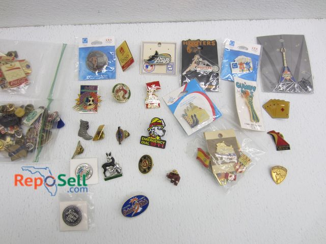 Lot 31-1086 - (100+) Pin Backs