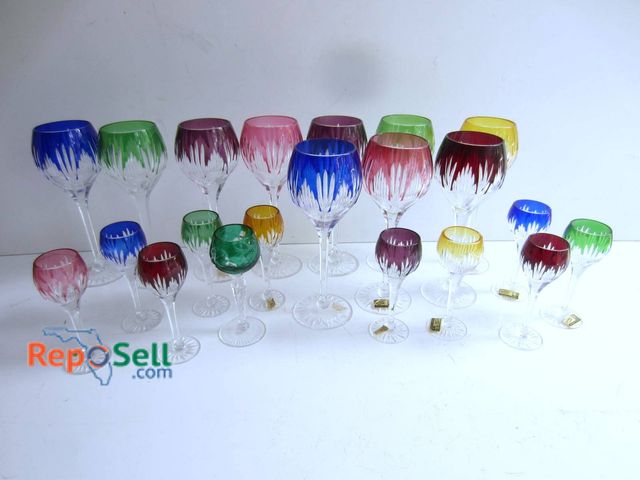 Lot 31-9231 - (21) multicolor cut-to-clear crystal stemware, including wine and cordial glasses. Features etched p...