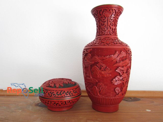 Lot 31-9120 - Carved Cinnabar Lacquer Vase And Box, Both Featuring Intricate Blue Enamel Interiors.