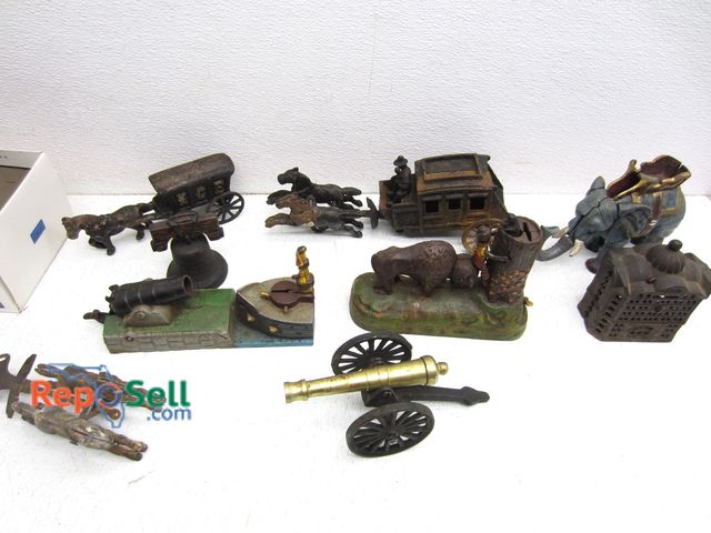 Lot 31-5102 - Collection of Vintage Metal Banks and Canons
