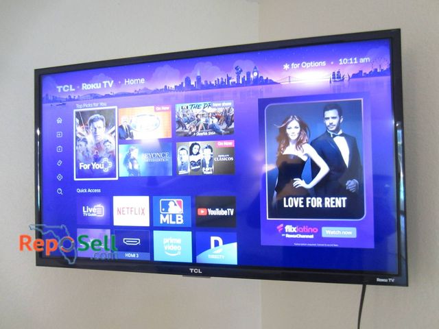 Lot 31-8614 - TCL Roku TV (approx 40")  With Wall Mount And Remote, Powers On, Buyer Must Remove