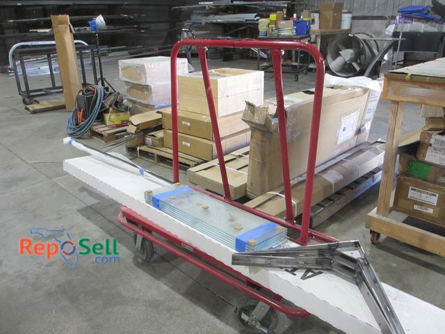 Lot 31-8348 - Uline Metal Plywood Dolly with Contents: (6) Tempered Glass Shelves 29.5"L