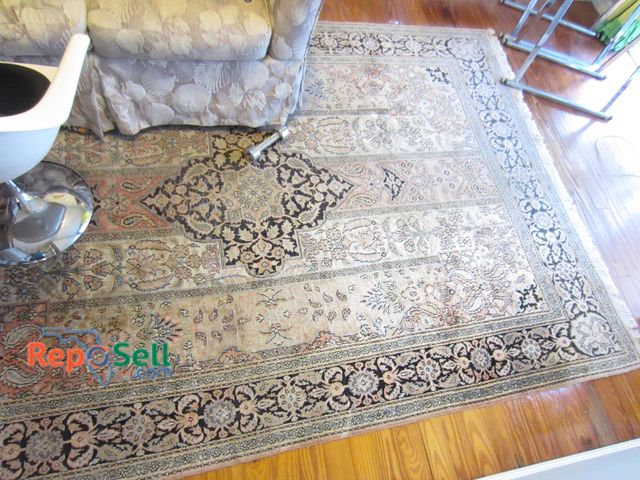 Lot 31-9012 - Hand-Knotted Oriental Rug Approximately 6x9 Feet With Floral Patterns And Fringe Border.