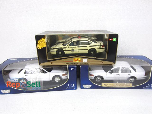 Lot 31-1210 - (3) Diecast Police Cars New Inbox 1:18 Scale: Military Police, New York Police, etc.