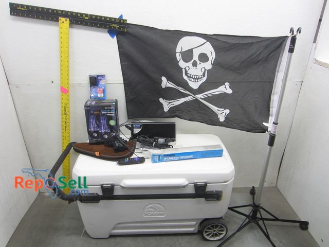 Lot 31-2472 - Large Igloo Cooler With Sig Sauer BB Gun, (2) Bluetooth Speakers, Pirate Flag etc