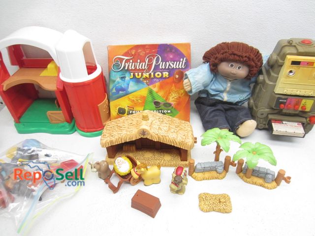 Lot 31-6055 - Tote Of Vintage Toys: 8-Track Player, Cabbage Patch Kid, Fisher Price etc