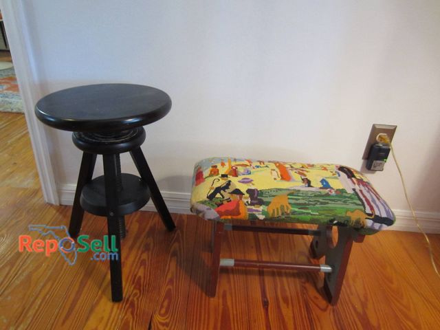 Lot 31-9013 - Adjustable Black Stool With Screw Mechanism And Upholstered Bench With Art Motif.